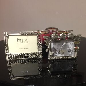 Two silver frames. Family and grandkids